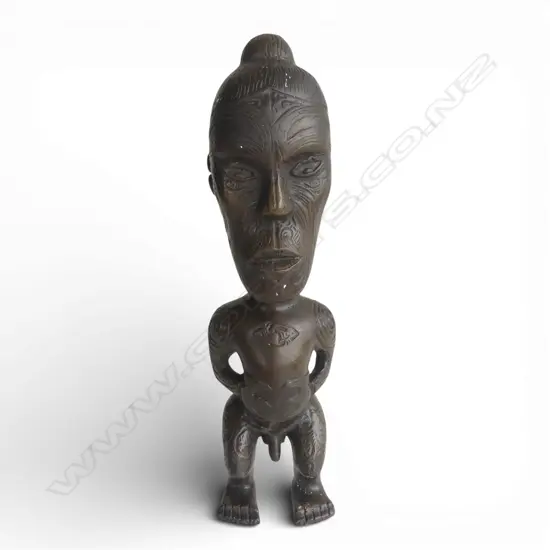 A cast bronze Māori tekoteko standing figure,