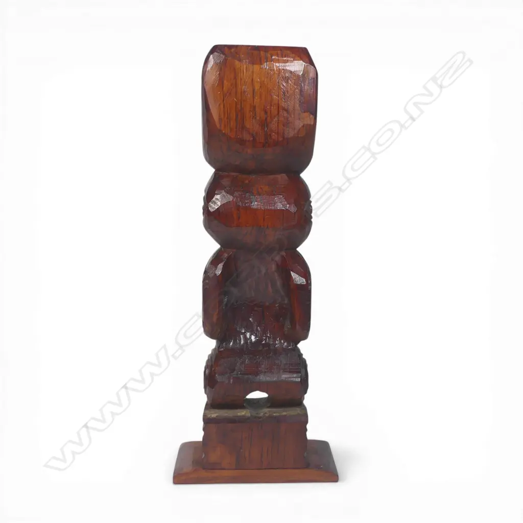 Mid / late 20thC Māori carved standing pou (post/figure), with extended forked tongue and paua disc eyes. Dark stained finish. H.565mm. Image 1++