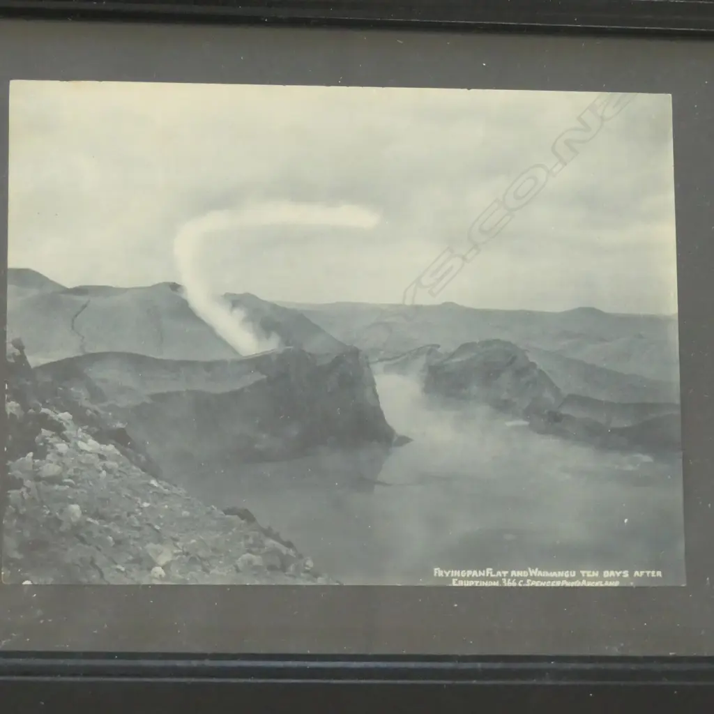 A vintage photograph of a Māori guide with a framed reprint 'Fryingpan Flat and Waimangu - Ten Days After Eruption' by C. Spencer, Image 1++