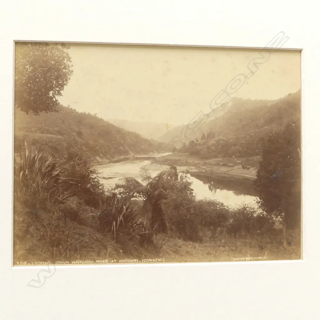 Seven vintage photographs including 'Looking down Wanganui River at Koroniti', 'Echo Lake, Dec '87' by Burton Bros, 'Echo Lake and Hole in the Wall Crater, Rotomahana', 'South Crater, The Termination of Rotomahana' and 'Coffee Cups, White Terrace' by George Valentine plus two further images of Mitre Peak and river scene by photographers unknown. Image 1++