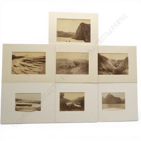 Seven vintage photographs including 'Looking down Wanganui River at Koroniti', 'Echo Lake, Dec '87' by Burton Bros, 'Echo Lake and Hole in the Wall Crater, Rotomahana', 'South Crater, The Termination of Rotomahana' and 'Coffee Cups, White Terrace' by George Valentine plus two further images of Mitre Peak and river scene by photographers unknown.