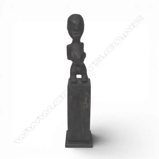An African carved figure,