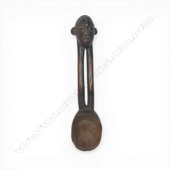A West African Dan carved figural spoon,