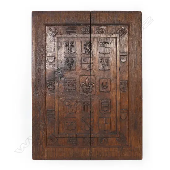 An oak panel carved with shields of the 30 French knights from the 'Combat des Trente',