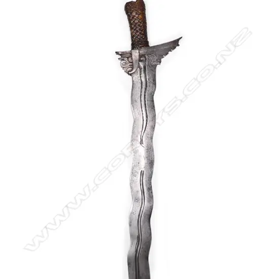 An 18th/19thC large and impressive Indonesian Moro fighting kris sword,