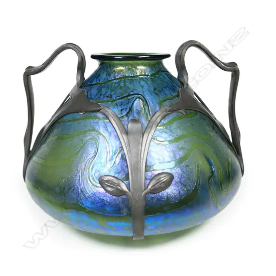 A late 19thC Art Nouveau Fritz Heckert iridescent glass vase in pewter mount,
