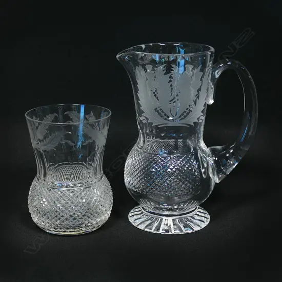 A set of eight Edinburgh crystal whisky glasses and matching water jug,