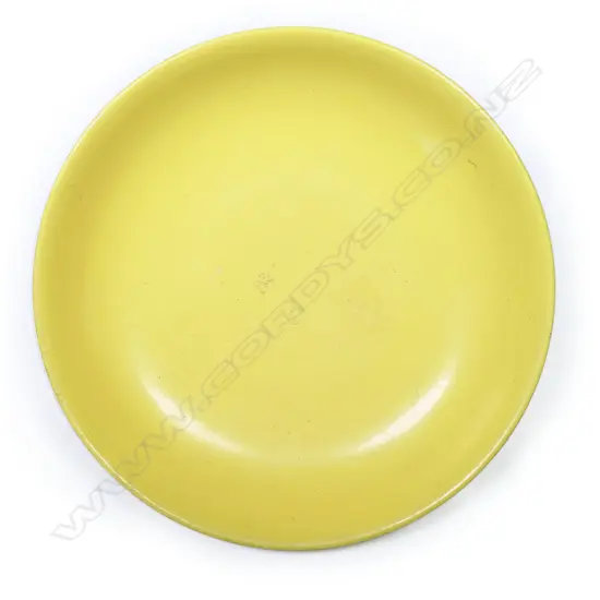 A Chinese porcelain imperial yellow saucer dish. Six underglaze blue character mark to the base within a double circle. Possibly Republic period.