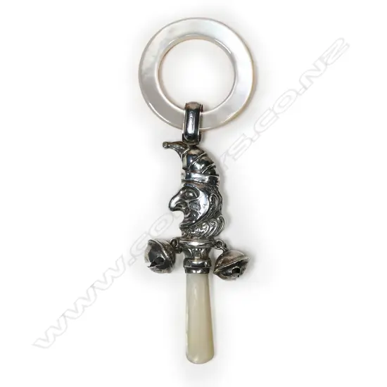 A silver and simulated mother of pearl baby rattle,