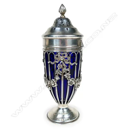 An Edwardian Regency style silver sugar caster,