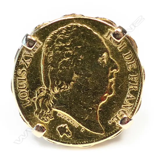 A 21ct gold 1819 French 20 Franc coin,