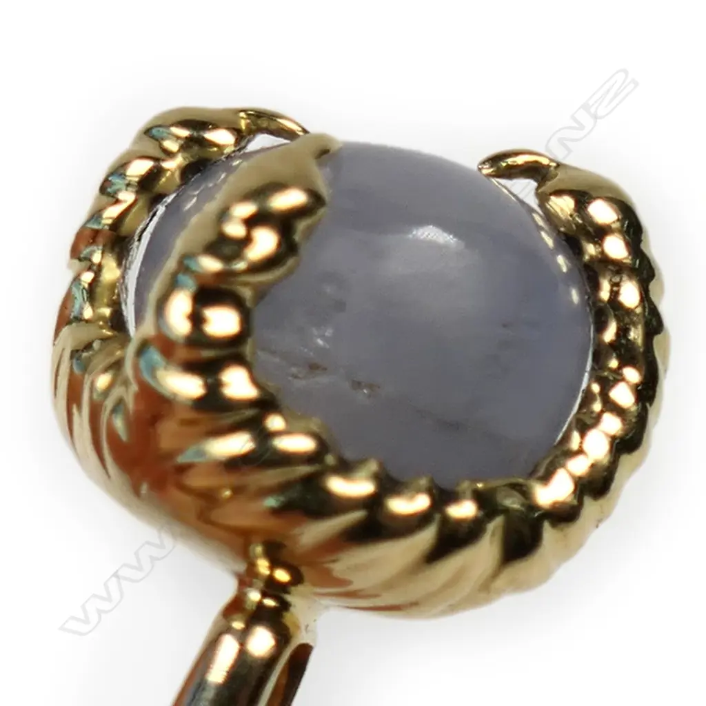 A pair of designer 9ct yellow gold and star sapphire cufflinks, Image 1++