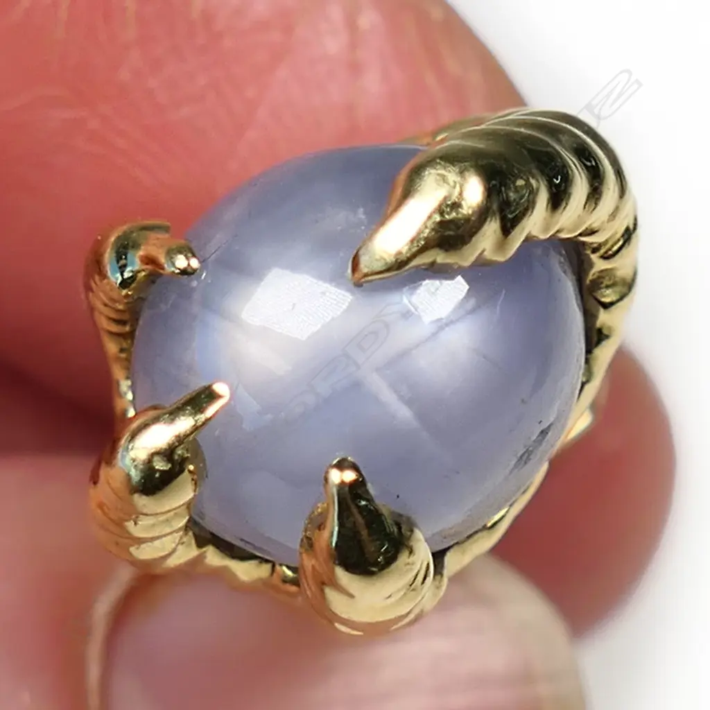 A pair of designer 9ct yellow gold and star sapphire cufflinks, Image 1++