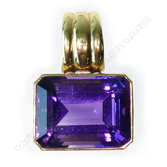 An 18ct yellow gold and large amethyst pendant,