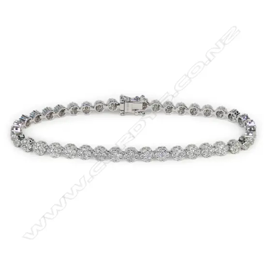 An 18ct white gold and diamond tennis bracelet,