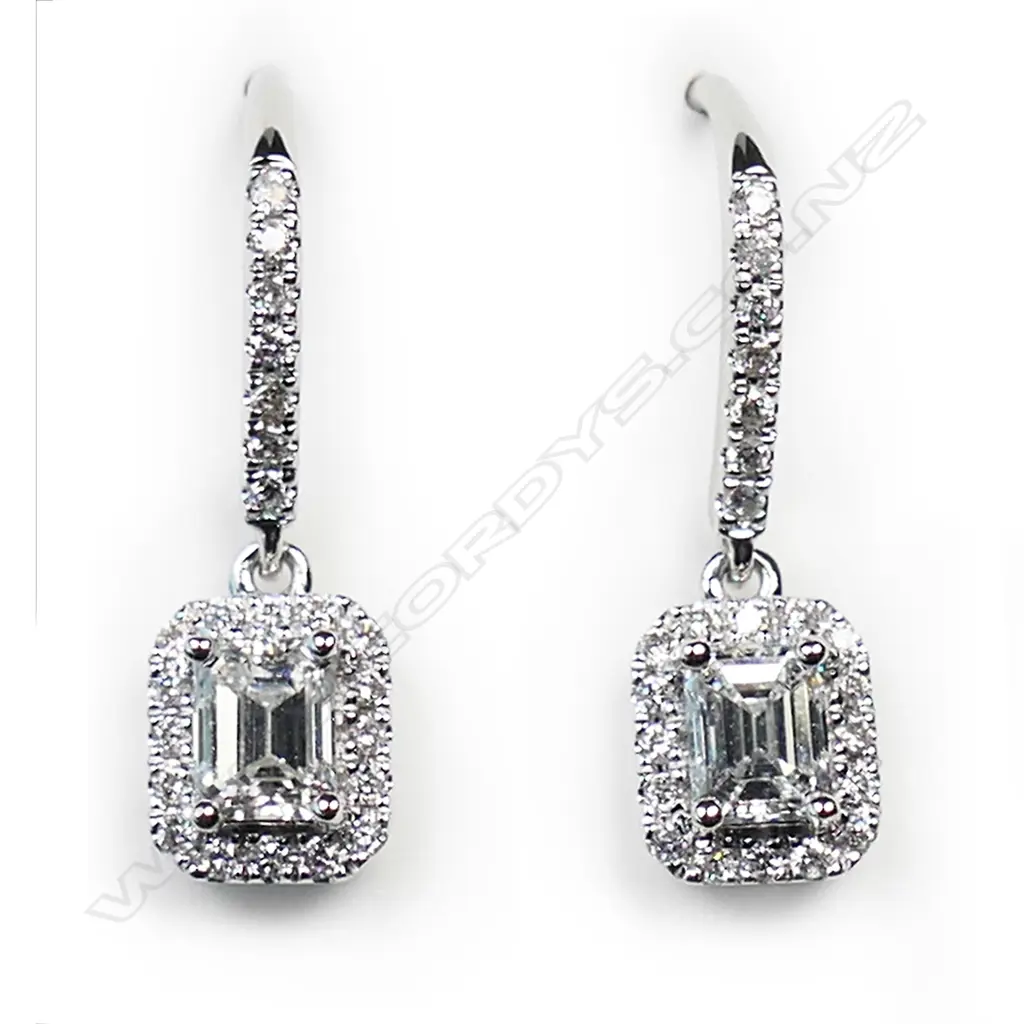 A pair of 18ct white gold and diamond earrings, Image 1++