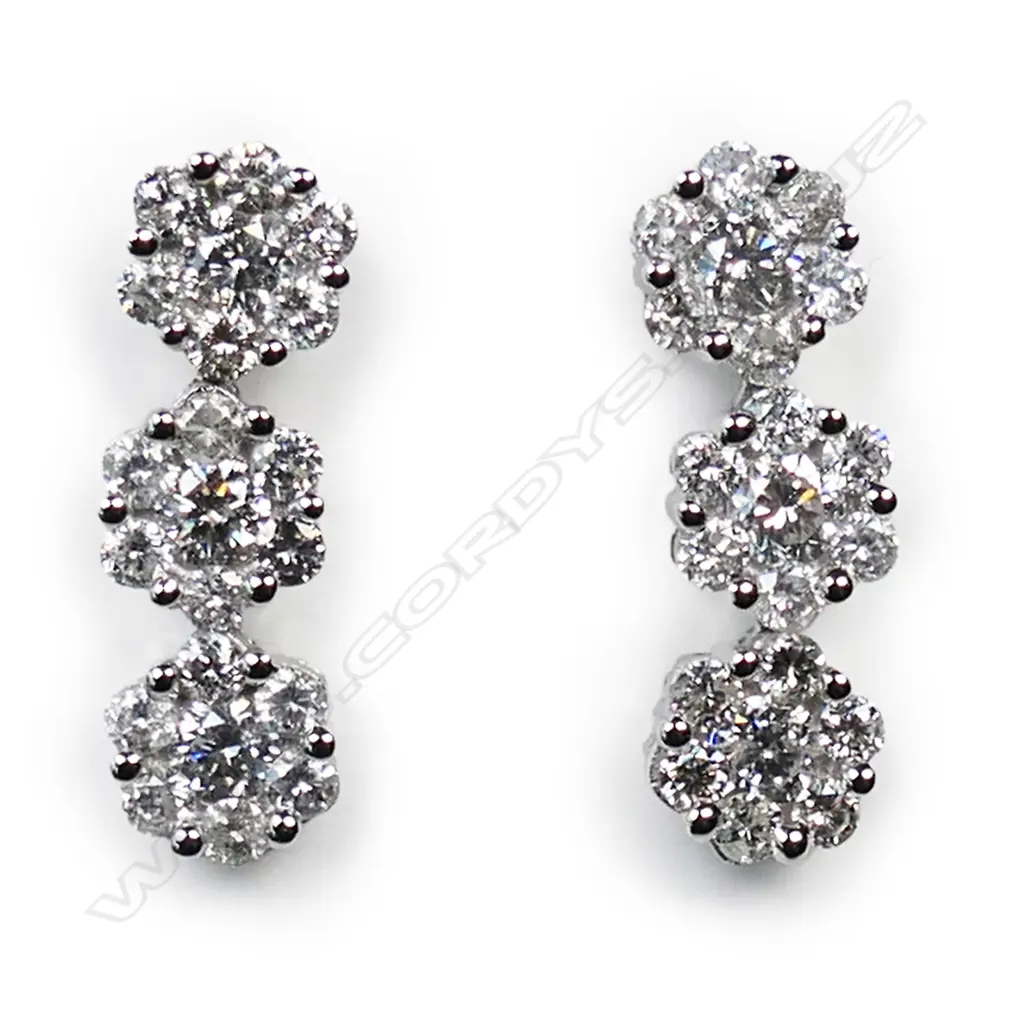 A pair of 18ct white gold and diamond earrings, Image 1++