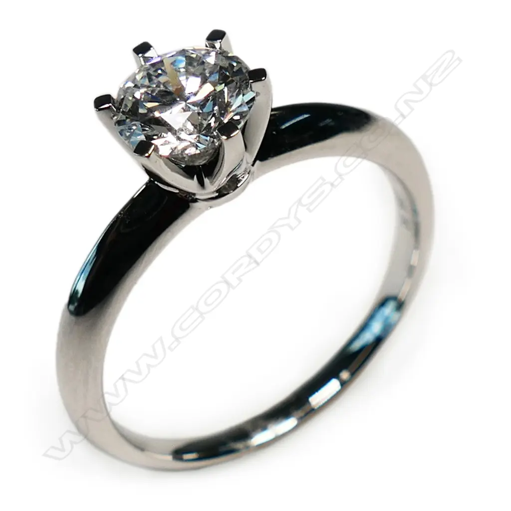 An 18ct white gold and diamond solitaire ring, Image 1++