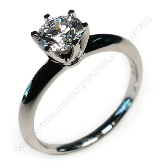 An 18ct white gold and diamond solitaire ring,