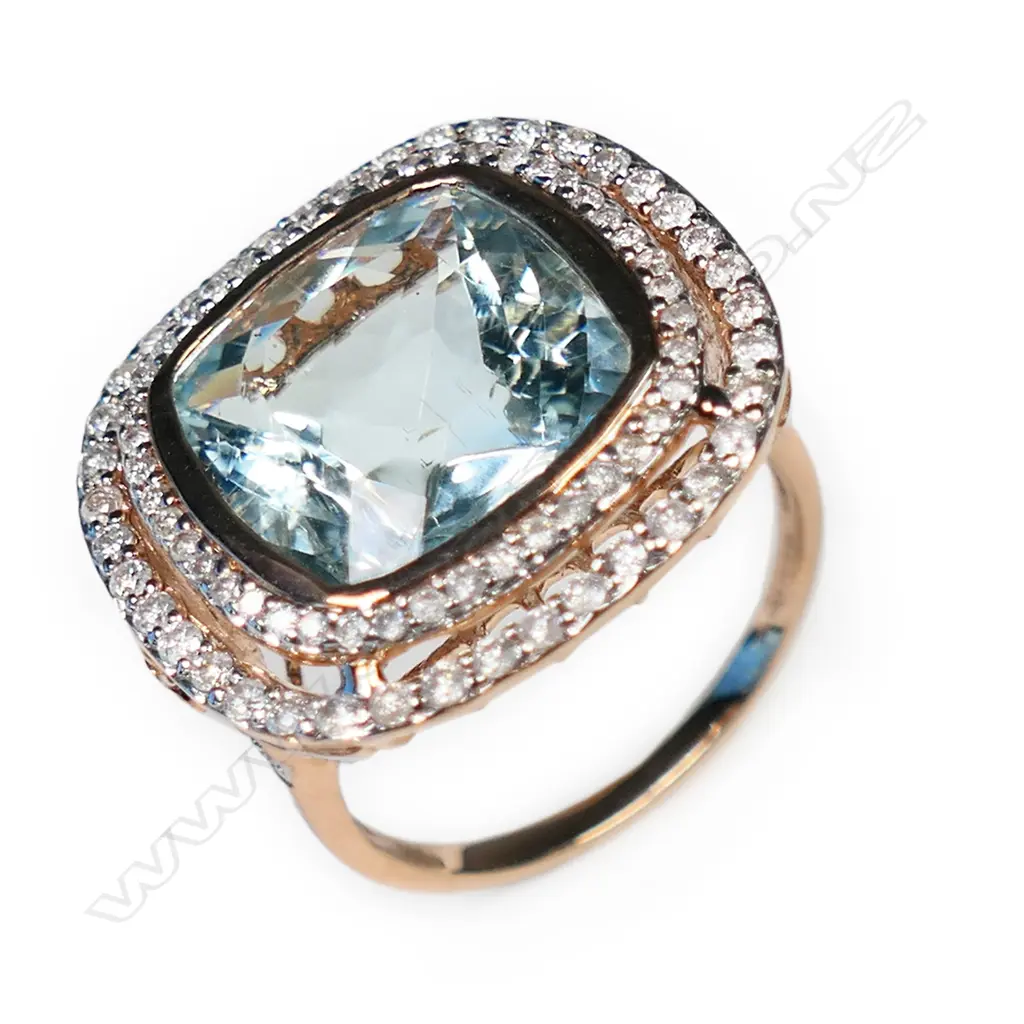 A 14ct rose gold, aquamarine and diamond double halo ring, Image 1++