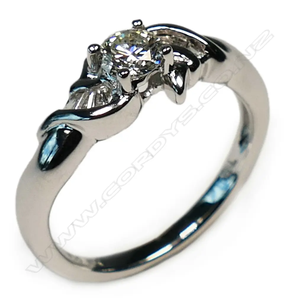 18ct white gold and diamond solitaire ring Image 1++
