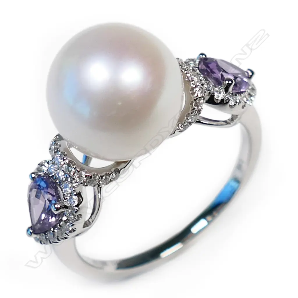 A 14ct white gold pearl, purple sapphire and diamond vintage style ring, Image 1++