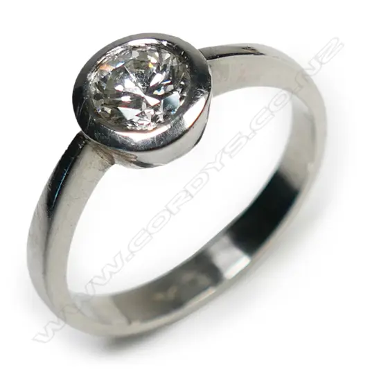 A platinum and diamond solitaire ring,