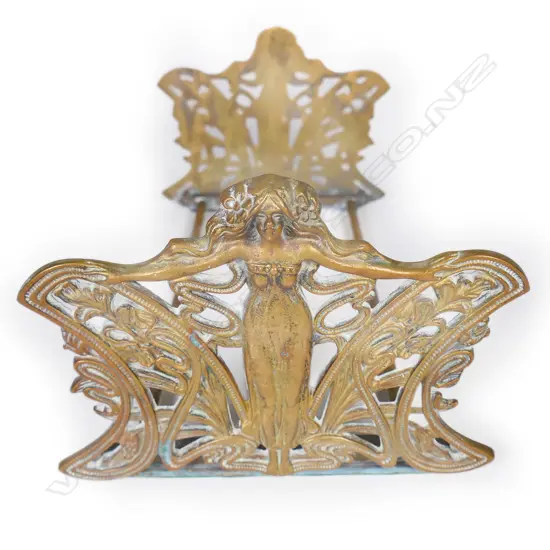 A pair of brass Art Nouveau adjustable bookends,