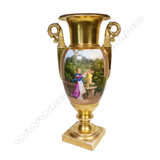 A large and impressive heavily gilded urn,