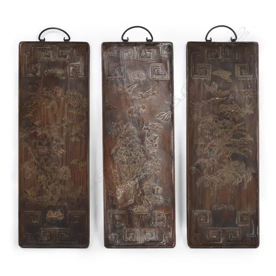 Set of three Chinese carved wood panels,