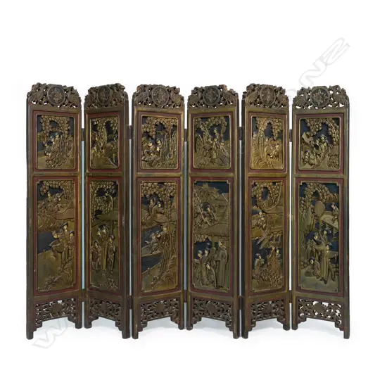 An early 20thC Chinese six panel carved low screen,