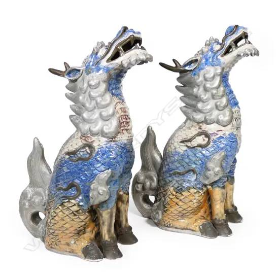 A pair of large Chinese guardian shishi dragon lions,