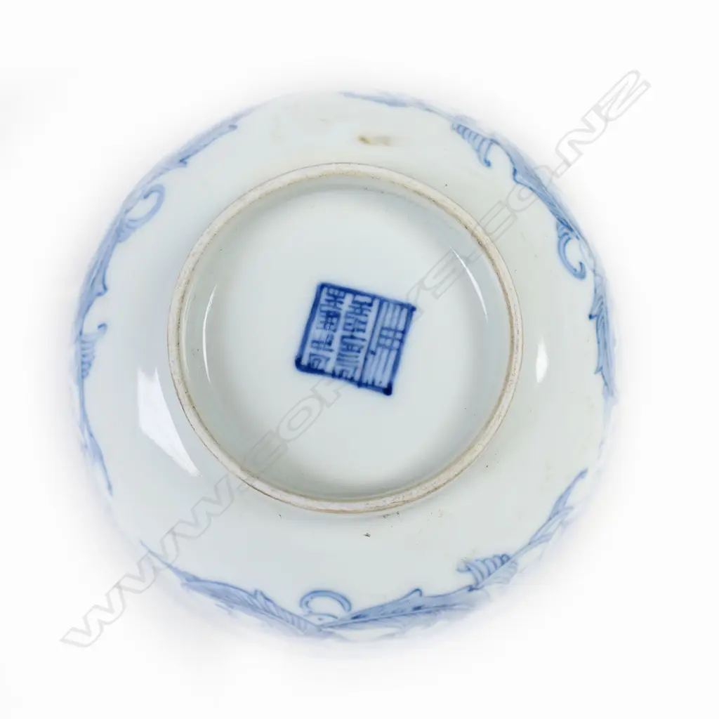 A set of four Chinese rise bowls in underglaze blue with plain interior. Six character mark to base. Dia.115mm. Possibly a shipwreck find. Image 1++