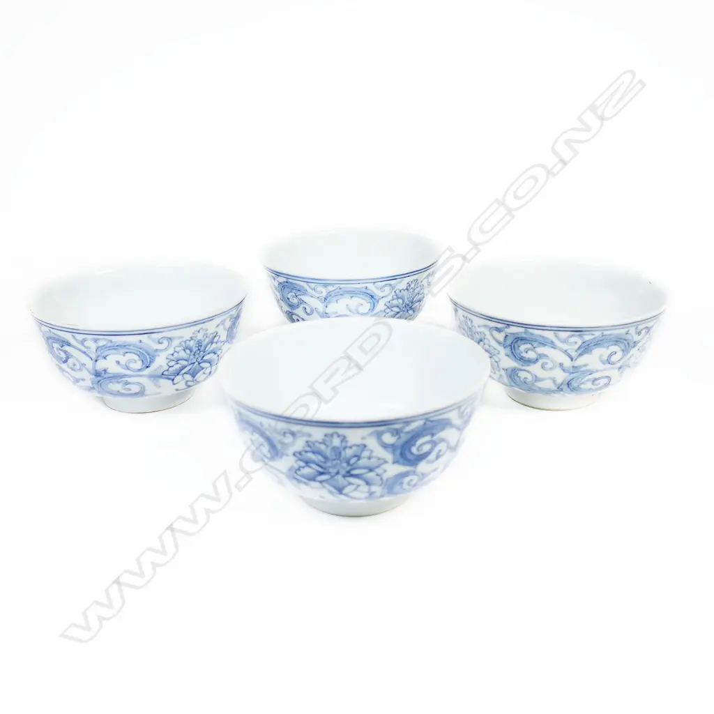 A set of four Chinese rise bowls in underglaze blue with plain interior. Six character mark to base. Dia.115mm. Possibly a shipwreck find. Image 1++