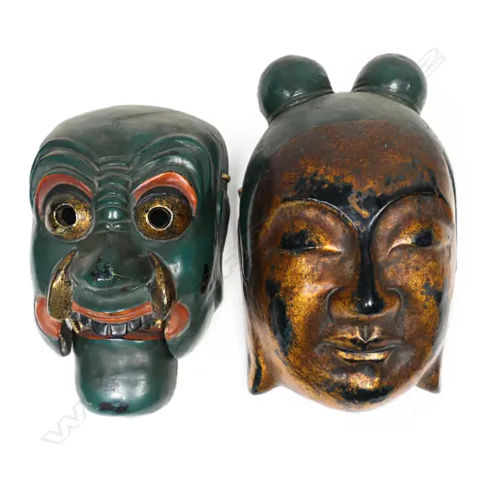Two Chinese painted and gilded masks,