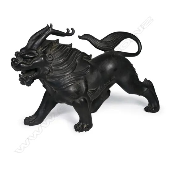 A Japanese solid bronze (wax cast) mythical beast,