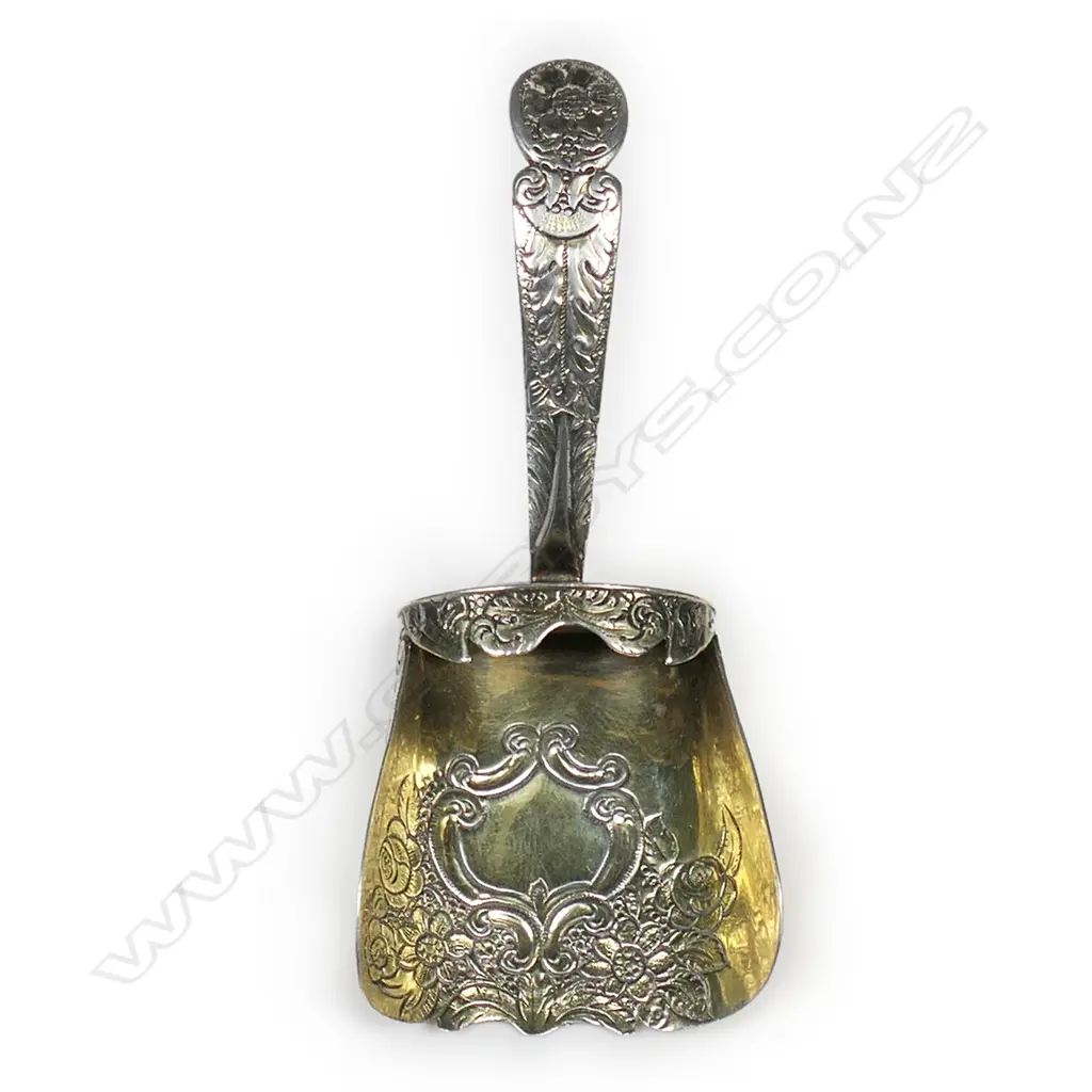 A George III silver caddy spoon, Image 1++