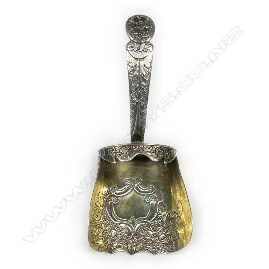 A George III silver caddy spoon,