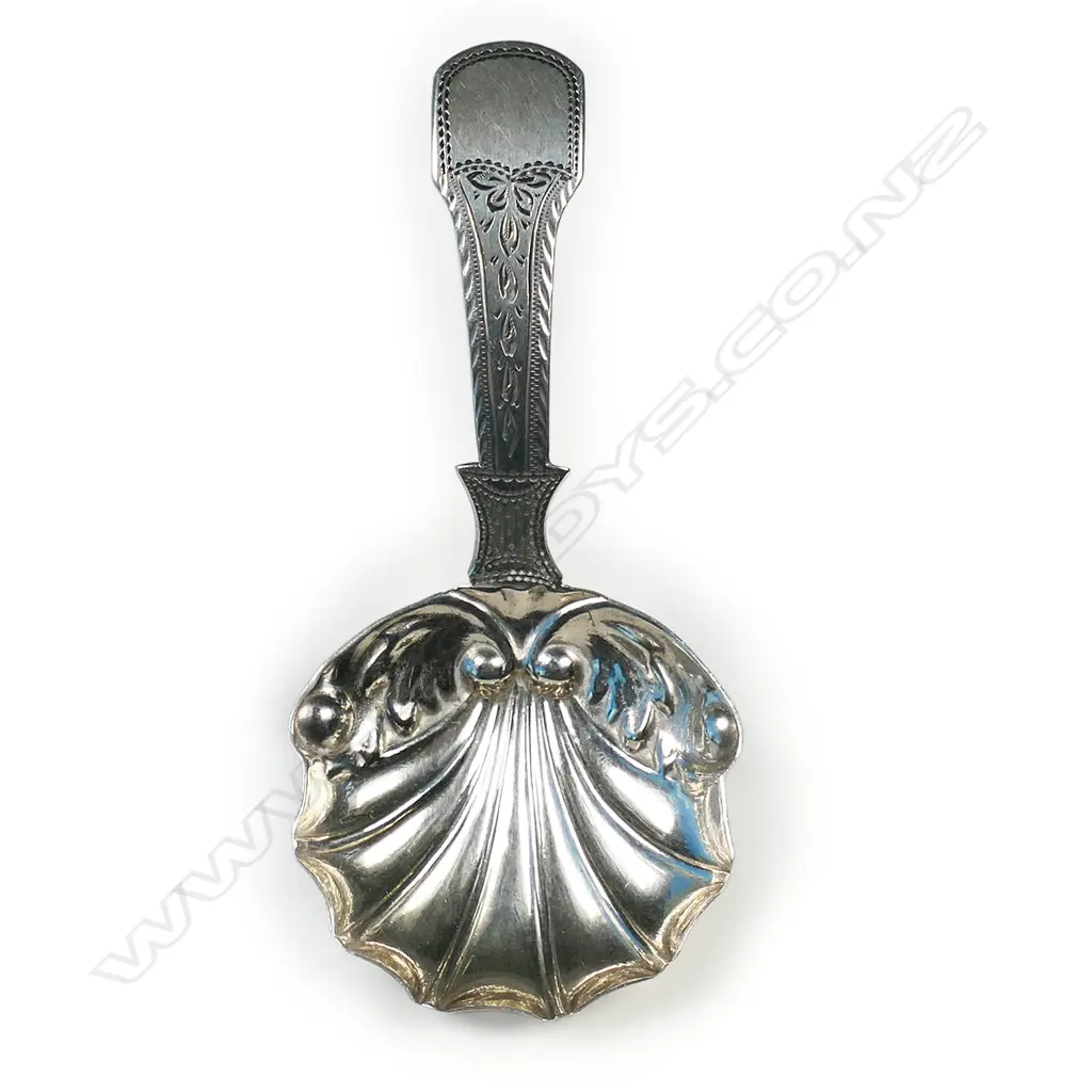 A George III silver caddy spoon, Image 1++