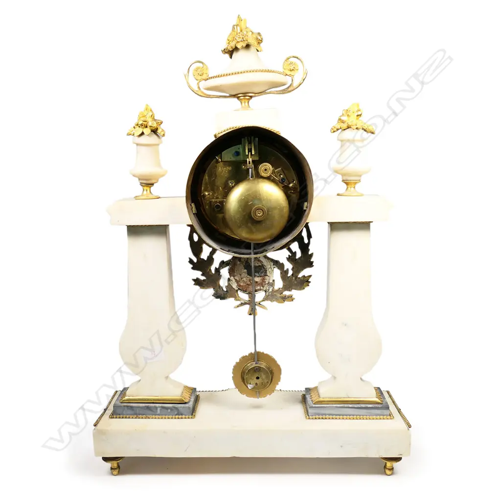 A Louis XVI white marble and ormolu mantel clock by Contreau of Paris, Image 1++