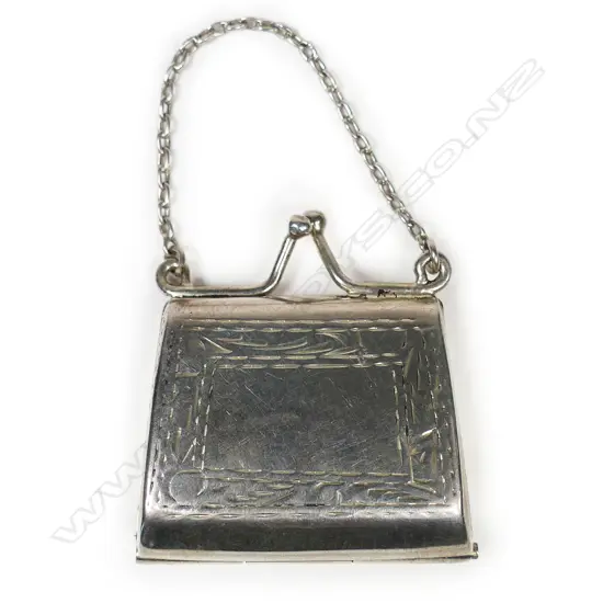 A silver stamp holder,
