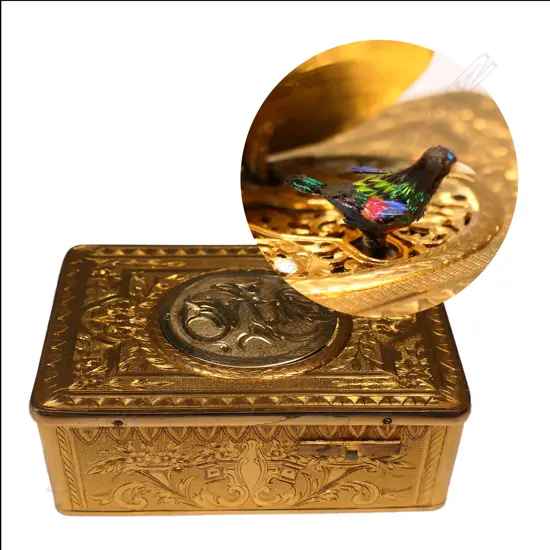 A rare early 20thC French Bontem singing bird gilded box,