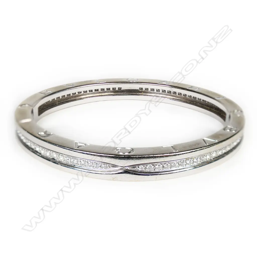 An 18ct white gold and diamond Bvlgari hinged bangle, Image 1++