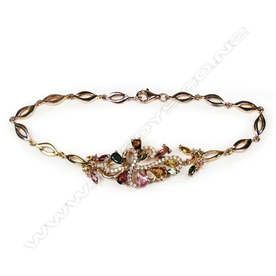 An 18ct rose gold diamond and mixed tourmaline bracelet,