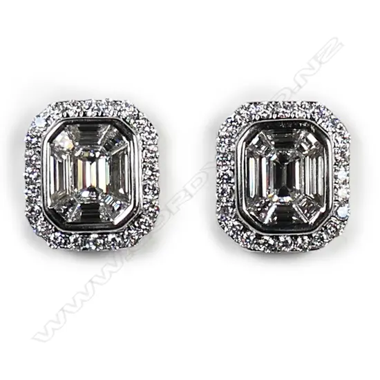 A pair of 18ct white gold and diamond stud earrings,
