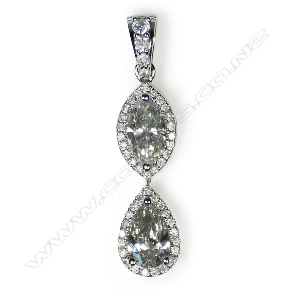 A 14ct white gold diamond double drop pendant, Image 1++