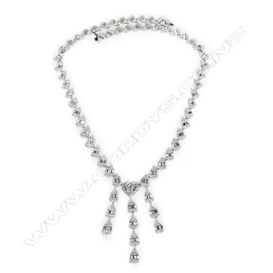 An impressive 18ct white gold and diamond encrusted necklace,