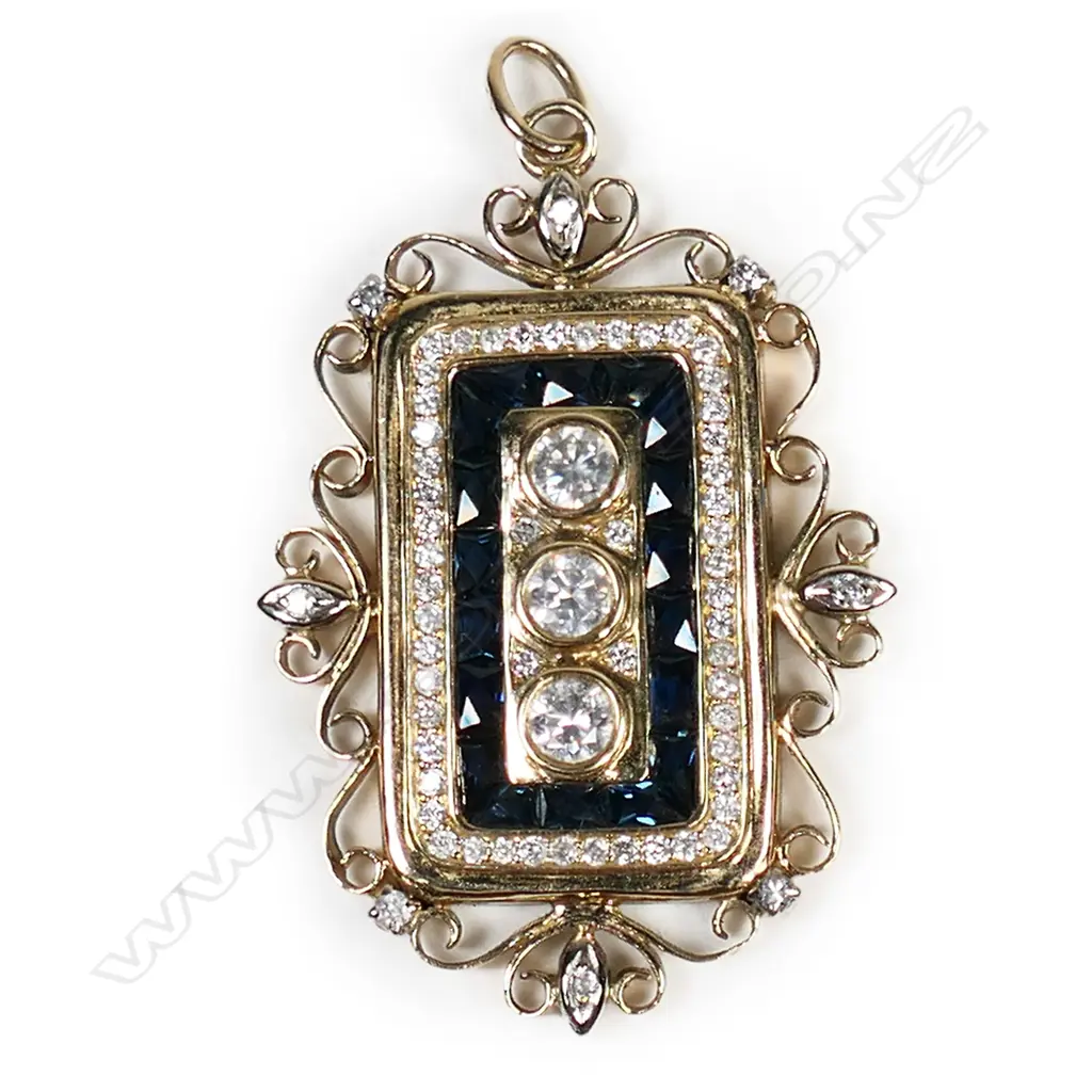A 14ct yellow gold sapphire and diamond pendant, Image 1++