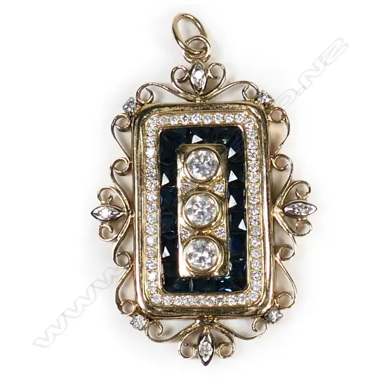 A 14ct yellow gold sapphire and diamond pendant,
