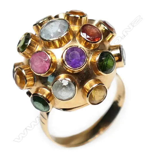 A vintage 18ct yellow gold multi gem designer ring,